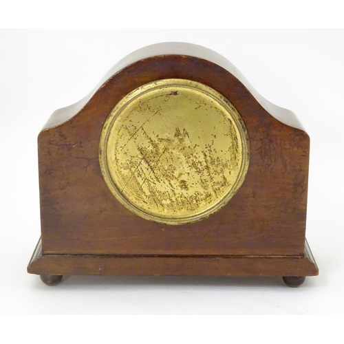 1402 - A 20thC mantle clock with French movement. 7 1/2