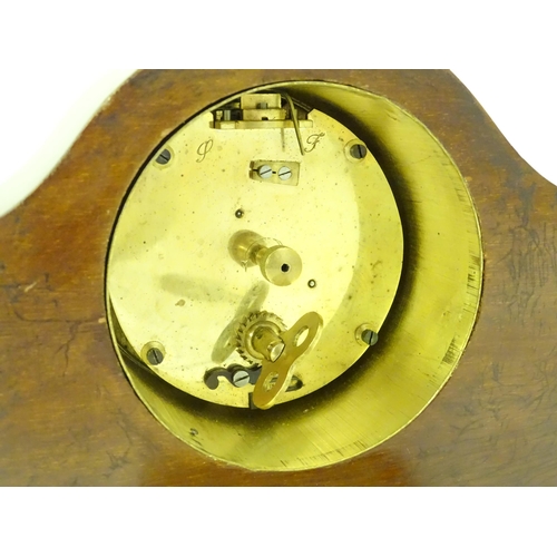 1402 - A 20thC mantle clock with French movement. 7 1/2