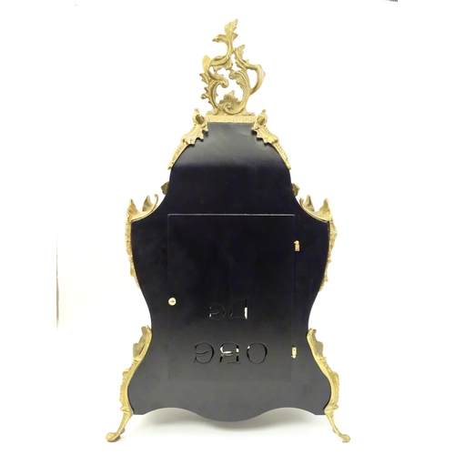 1395 - A Louis XIV style ' Le Ore ' mantel clock by Franz Hermle & Sons Approx 22