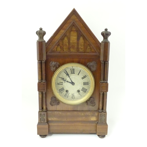 1398 - A Victorian Gothic revival mantle clock the architectural formed case with twin columns, trefoil det... 