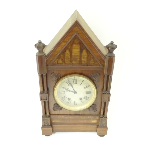 1398 - A Victorian Gothic revival mantle clock the architectural formed case with twin columns, trefoil det... 