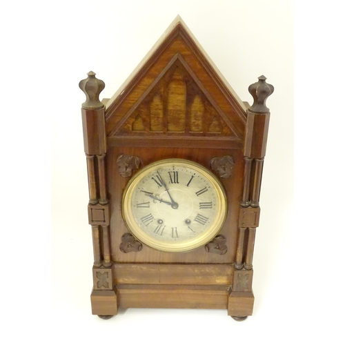 1398 - A Victorian Gothic revival mantle clock the architectural formed case with twin columns, trefoil det... 