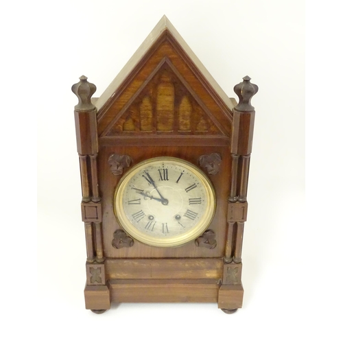 1398 - A Victorian Gothic revival mantle clock the architectural formed case with twin columns, trefoil det... 