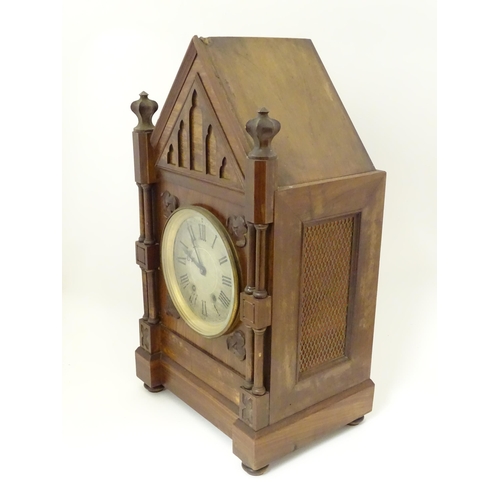 1398 - A Victorian Gothic revival mantle clock the architectural formed case with twin columns, trefoil det... 