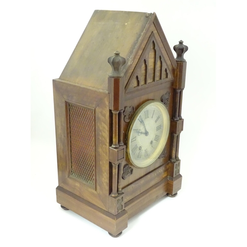 1398 - A Victorian Gothic revival mantle clock the architectural formed case with twin columns, trefoil det... 