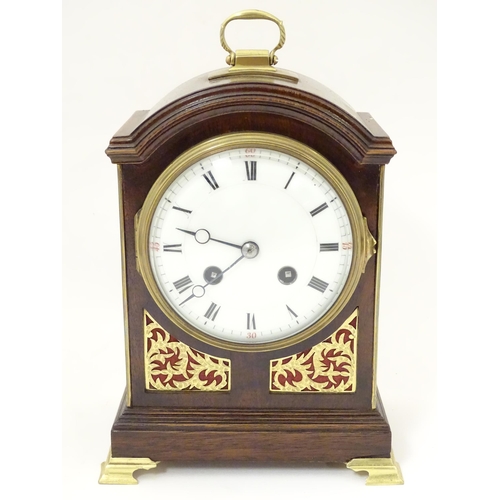 1406 - A 20thC small proportion mahogany bracket clock, in the Regency style, with white enamel dial and 8-... 