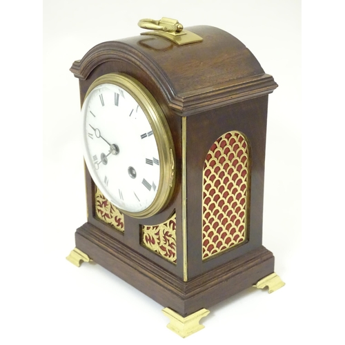 1406 - A 20thC small proportion mahogany bracket clock, in the Regency style, with white enamel dial and 8-... 