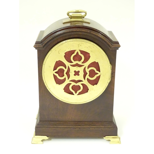 1406 - A 20thC small proportion mahogany bracket clock, in the Regency style, with white enamel dial and 8-... 