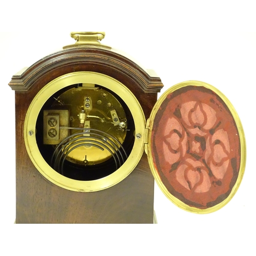 1406 - A 20thC small proportion mahogany bracket clock, in the Regency style, with white enamel dial and 8-... 