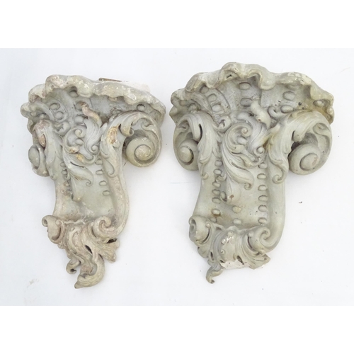 1353 - Garden & Architectural, Salvage: a pair of reconstituted stone brackets decorated with scrolling flo... 