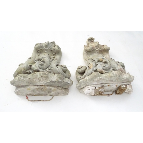 1353 - Garden & Architectural, Salvage: a pair of reconstituted stone brackets decorated with scrolling flo... 