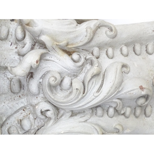 1353 - Garden & Architectural, Salvage: a pair of reconstituted stone brackets decorated with scrolling flo... 