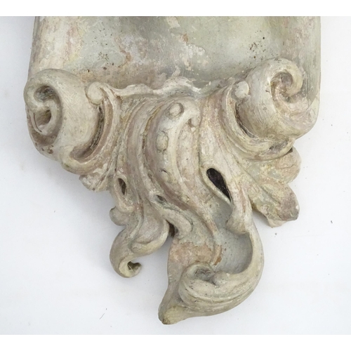 1353 - Garden & Architectural, Salvage: a pair of reconstituted stone brackets decorated with scrolling flo... 