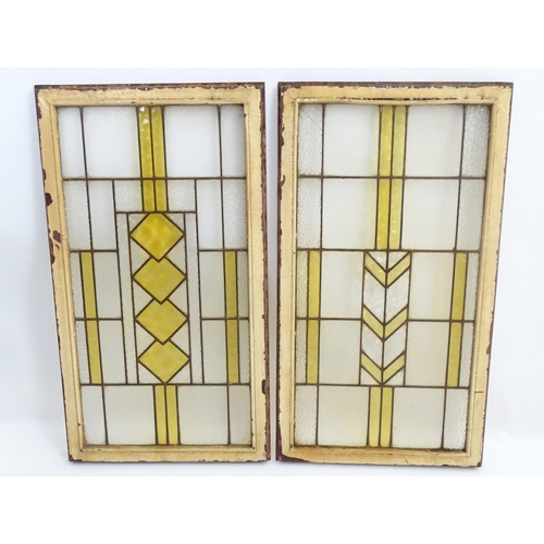 1355 - Two Art Deco stained glass window panes / panels with geometric and chevron detail. Approx. 35