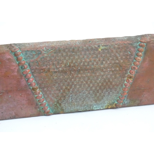 1360 - An early 20thC kerb fender, of copper construction with sectional decoration, approximately 50