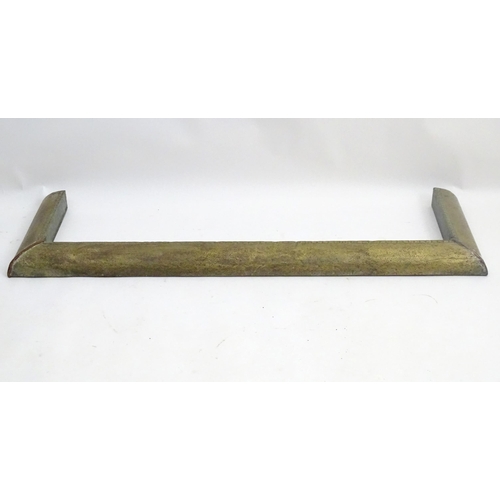 1362 - An early 20thC brass kerb fender, decorated with stippled finish and floral binding. 48 1/2