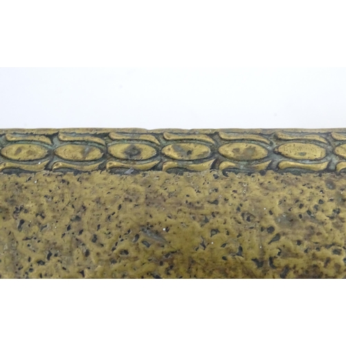 1362 - An early 20thC brass kerb fender, decorated with stippled finish and floral binding. 48 1/2