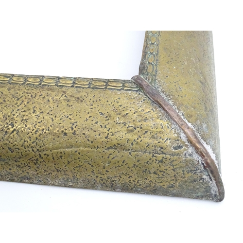 1362 - An early 20thC brass kerb fender, decorated with stippled finish and floral binding. 48 1/2