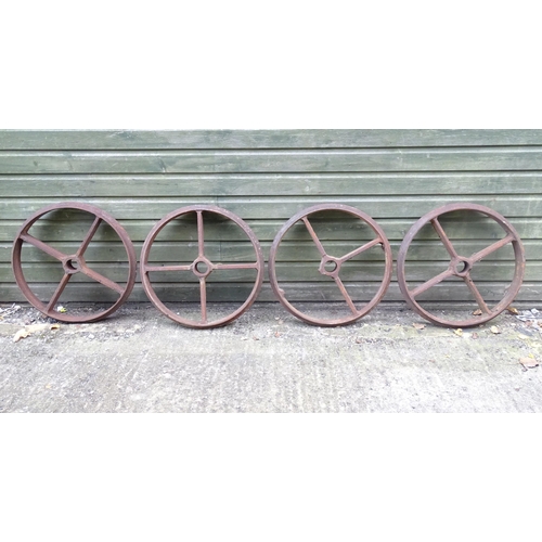 1363 - A set of four Victorian cast iron shepherd's hut wheels, each approximately 25