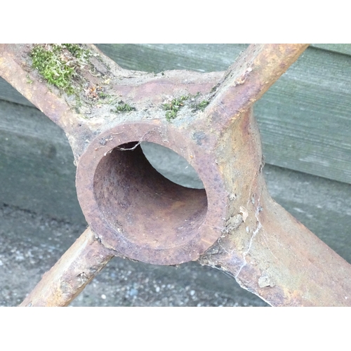 1363 - A set of four Victorian cast iron shepherd's hut wheels, each approximately 25