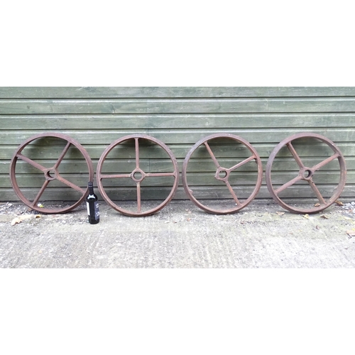 1363 - A set of four Victorian cast iron shepherd's hut wheels, each approximately 25