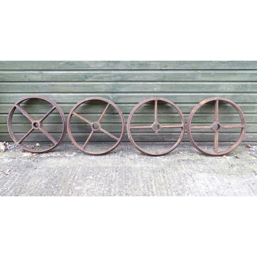 1363 - A set of four Victorian cast iron shepherd's hut wheels, each approximately 25