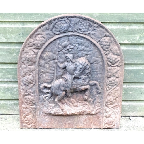 1367 - A 19thC continental cast iron fireback, of arch form and decorated with knight on horseback. Approxi... 