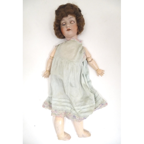 1298 - Toy: an early 20thC bisque doll by Herman Steiner , Bavaria. The head with back stamps: 'Made in Ger... 