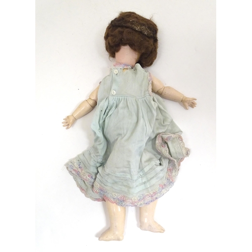 1298 - Toy: an early 20thC bisque doll by Herman Steiner , Bavaria. The head with back stamps: 'Made in Ger... 