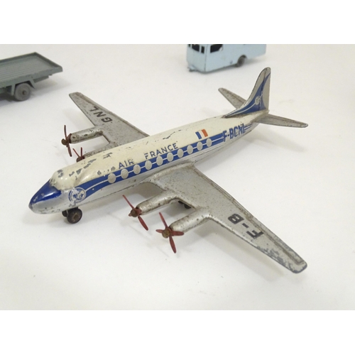 1303 - Toys: a quantity of assorted die cast / scale model vehicles, comprising Dinky Vickers Viscount 706 ... 