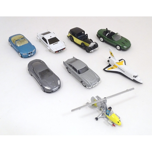 1306 - Toys: Corgi TY99135, a James Bond collectors vehicles / film canister 8 piece gift set, boxed, the c... 