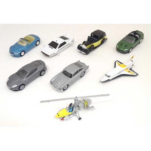 1306 - Toys: Corgi TY99135, a James Bond collectors vehicles / film canister 8 piece gift set, boxed, the c... 