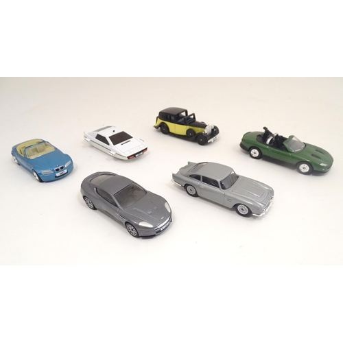 1306 - Toys: Corgi TY99135, a James Bond collectors vehicles / film canister 8 piece gift set, boxed, the c... 