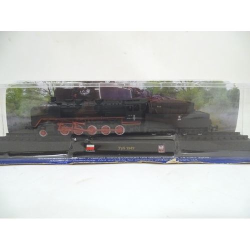 1310 - Toys: N gauge AmerCom collection model trains, comprising CP Seria 1200 1961 (Portugal), Amtrak F40P... 