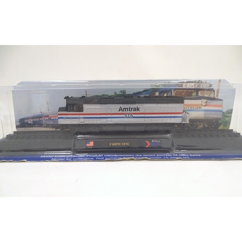 1310 - Toys: N gauge AmerCom collection model trains, comprising CP Seria 1200 1961 (Portugal), Amtrak F40P... 