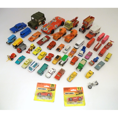 1312 - Toys: a quantity of assorted 20thC scale model cars / vehicles, the larger examples comprising a Tri... 