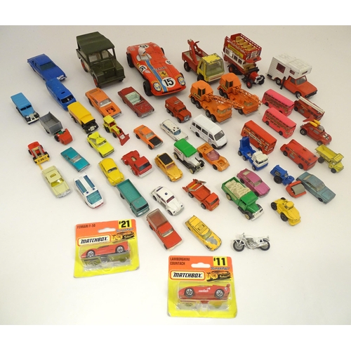 1312 - Toys: a quantity of assorted 20thC scale model cars / vehicles, the larger examples comprising a Tri... 