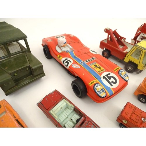 1312 - Toys: a quantity of assorted 20thC scale model cars / vehicles, the larger examples comprising a Tri... 