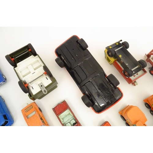 1312 - Toys: a quantity of assorted 20thC scale model cars / vehicles, the larger examples comprising a Tri... 