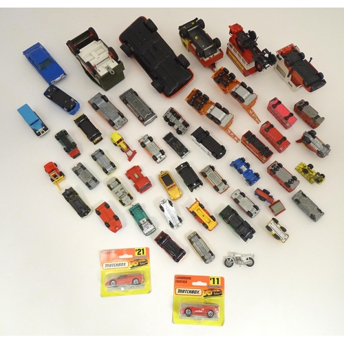 1312 - Toys: a quantity of assorted 20thC scale model cars / vehicles, the larger examples comprising a Tri... 