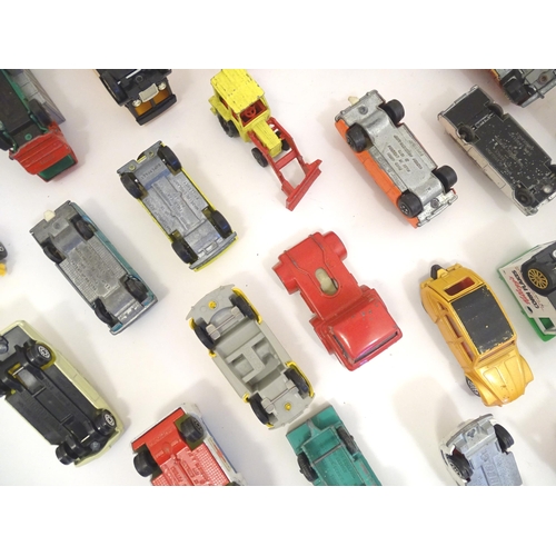 1312 - Toys: a quantity of assorted 20thC scale model cars / vehicles, the larger examples comprising a Tri... 