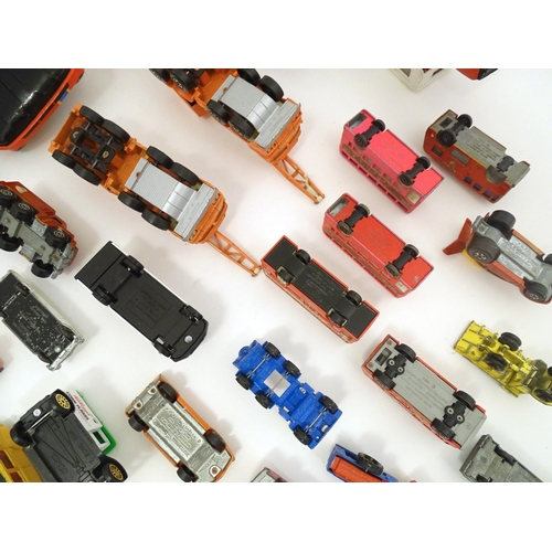 1312 - Toys: a quantity of assorted 20thC scale model cars / vehicles, the larger examples comprising a Tri... 