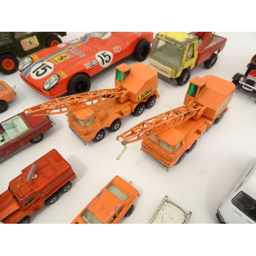 1312 - Toys: a quantity of assorted 20thC scale model cars / vehicles, the larger examples comprising a Tri... 