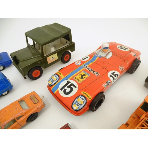 1312 - Toys: a quantity of assorted 20thC scale model cars / vehicles, the larger examples comprising a Tri... 