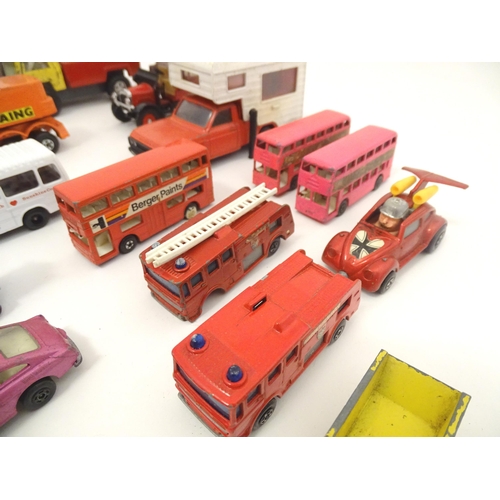 1312 - Toys: a quantity of assorted 20thC scale model cars / vehicles, the larger examples comprising a Tri... 