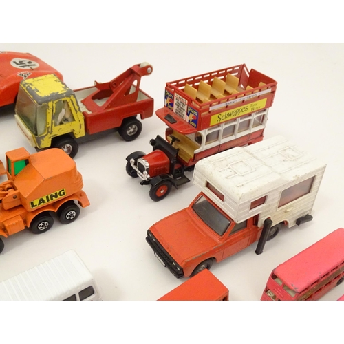 1312 - Toys: a quantity of assorted 20thC scale model cars / vehicles, the larger examples comprising a Tri... 