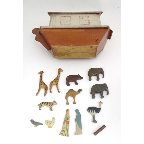 1314 - Toy: An early to mid 20thC hand made and hand painted model of Noah's Ark containing various carved ... 