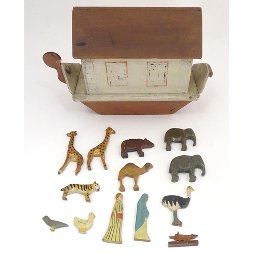 1314 - Toy: An early to mid 20thC hand made and hand painted model of Noah's Ark containing various carved ... 