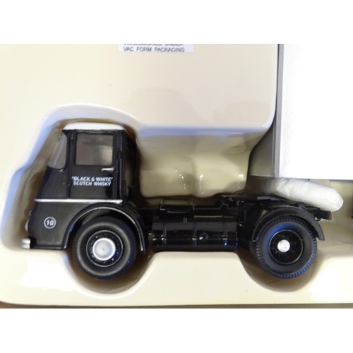 1316A - Toy: a boxed Corgi Classics 11401 ERF KV lorry & Artic Box Trailer, in Buchanan's Black & White Scot... 