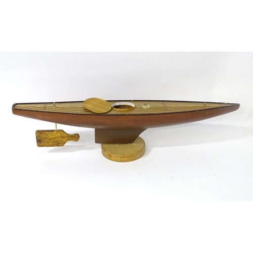 1323 - Toy: an early to mid 20thC model pond yacht / boat , carvel constructed from mahogany planks with bo... 